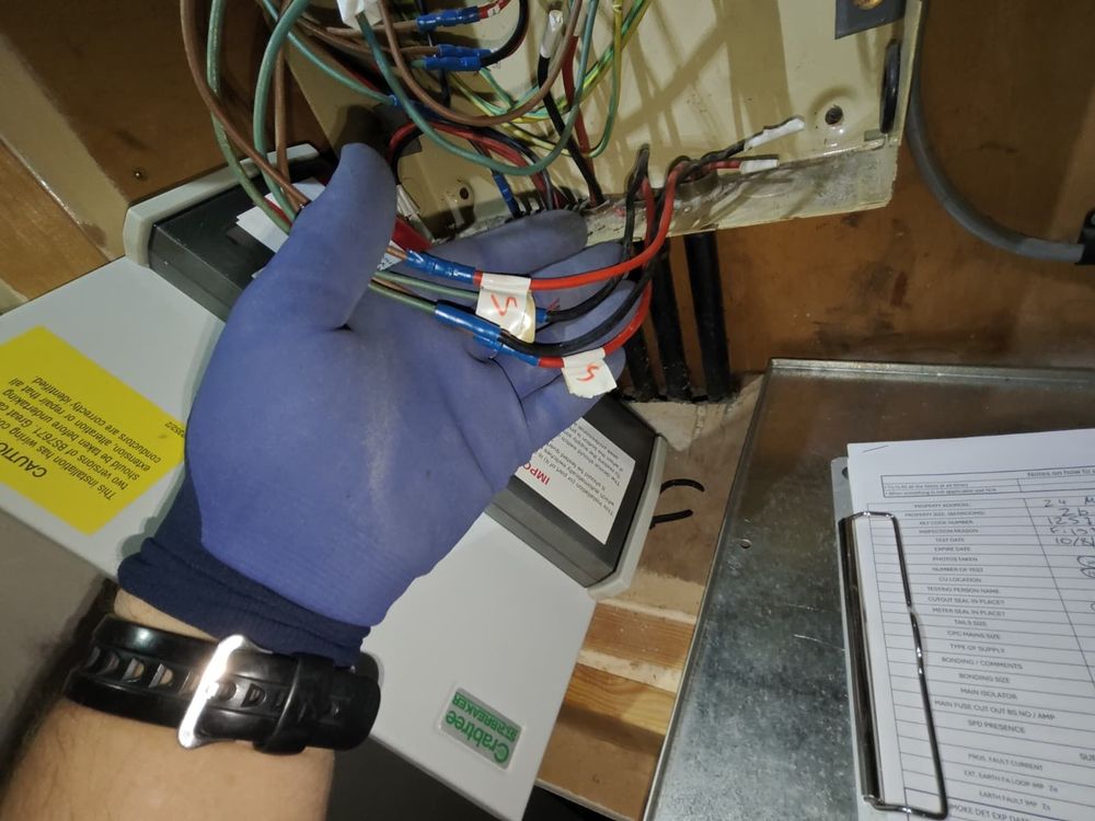 Connected cables under consumer unit